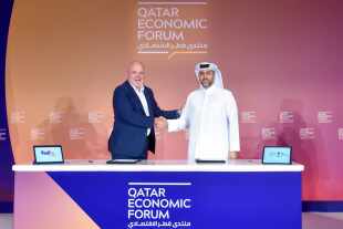 Sheikh Mohammed H. F. Al-Thani, CEO of Qatar Free Zones Authority and Patrick Moebel, President and CEO, FedEx Logistics.jpg