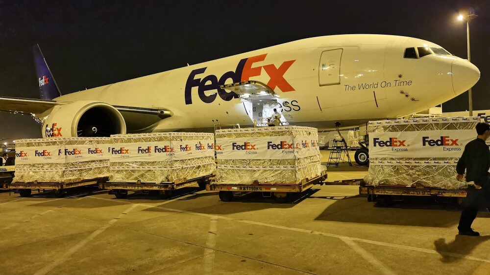 oxygen-concentrators-are-loaded-onto-fedex-plane-for-delivery-to-india.jpg