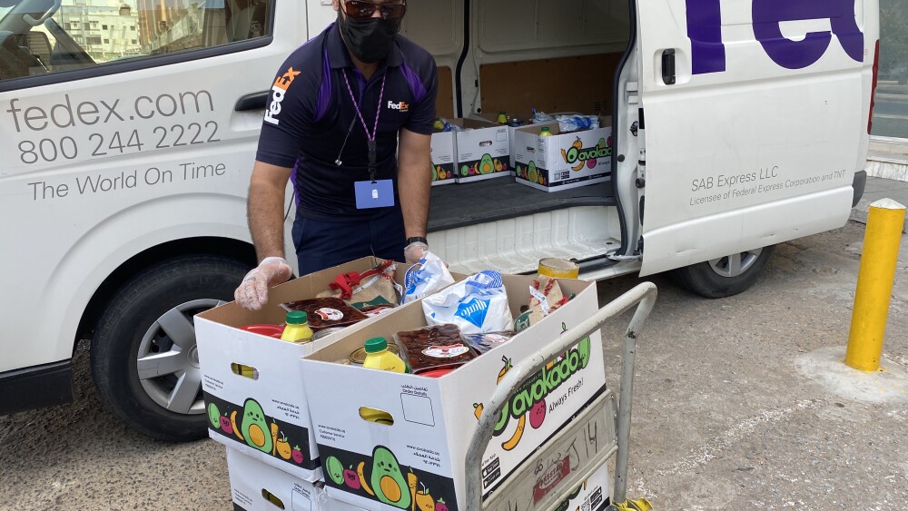 hassan-a-sab-express-courier-safely-delivering-ramadan-food-boxes.jpg