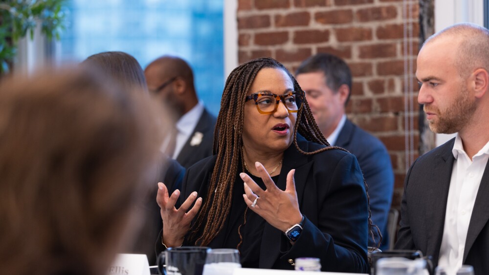 FedEx CSO Karen Blanks Ellis sits at a table speaking at Climate Week NYC 2025 roundtable event