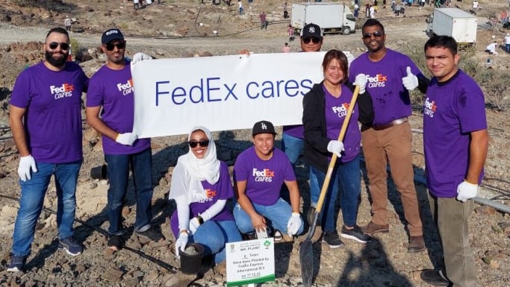 FedEx team members participate in tree planting to make the UAE a greener place.png