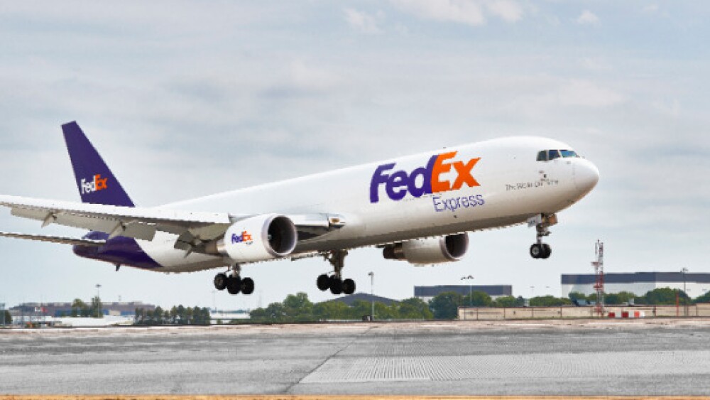 FedEx Restructures to Combine Ground and Express Delivery Networks - WSJ