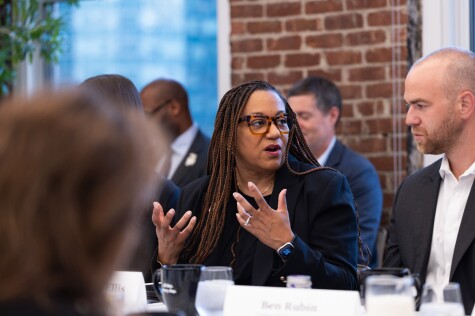 FedEx CSO Karen Blanks Ellis sits at a table speaking at Climate Week NYC 2025 event