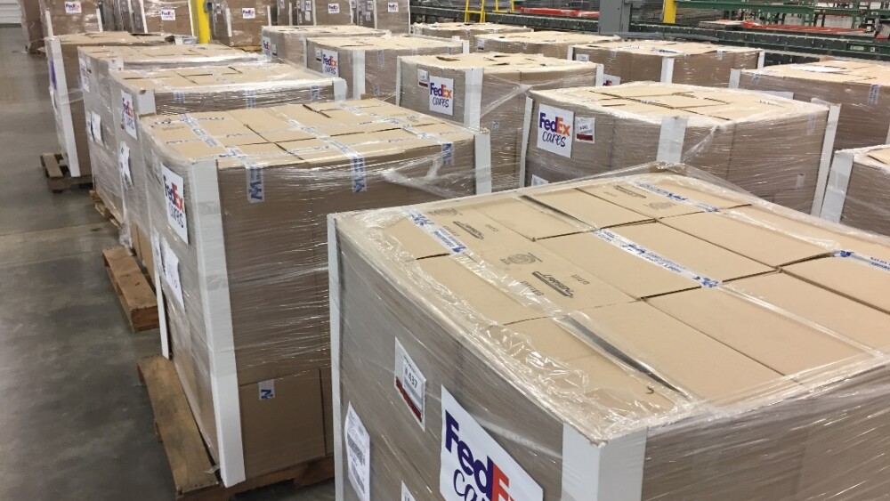pallets-of-aid-from-international-medical-corps-and-heart-to-heart-international-are-prepared-as-part-of-fedex-express-charitable-giving.jpg