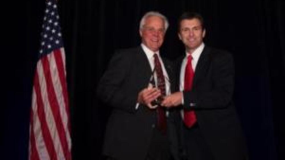 family-first-president-mark-merrill-recognizes-fedex-express-coo-mike-ducker-cropped.jpg