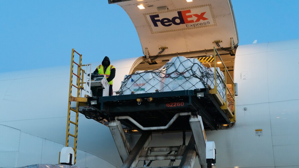 oxygen-concentrators-masks-and-critical-medical-supplies-are-loaded-onto-a-fedex-charter-flight-for-delivery-to-new-delhi-india-on-may-15-2021.jpg